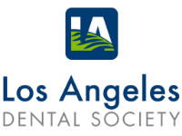 Logo of the Los Angeles Dental Society featuring stylized "LA" letters with leaf design in a blue and green square above the text "Los Angeles Dental Society.